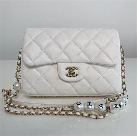 chanel small pearl logo strap flap bag|vintage Chanel flap bag small.